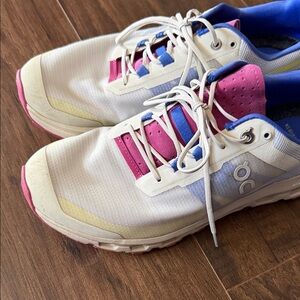 On Running Women's Shoes in White, Pink, and Blue